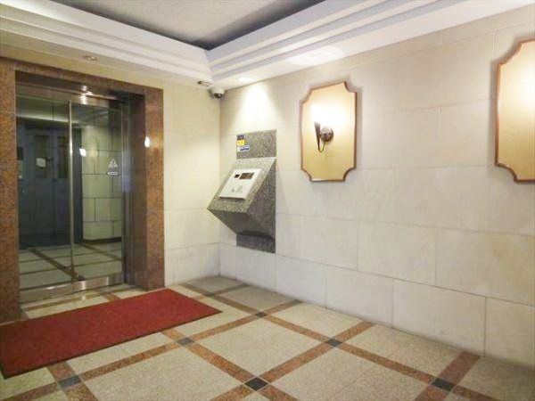 ���̑� �h�Ɩʂł����S�̃I�[�g���b�N�}���V�����I���玞�ɉו����󂯎����z�{�b�N�X�t���I